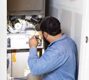 Home Watch Services from BAM Home Watch - checking heater 